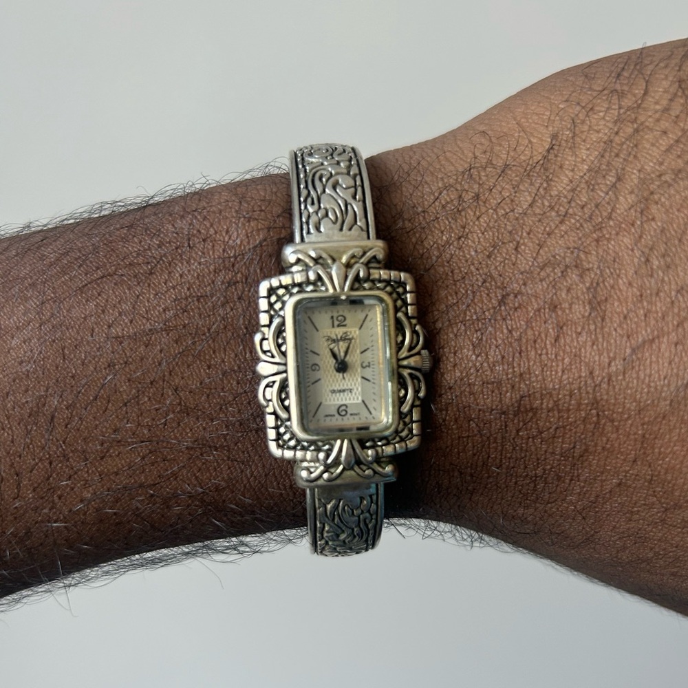 women’s vintage silver-ish gold-ish watch